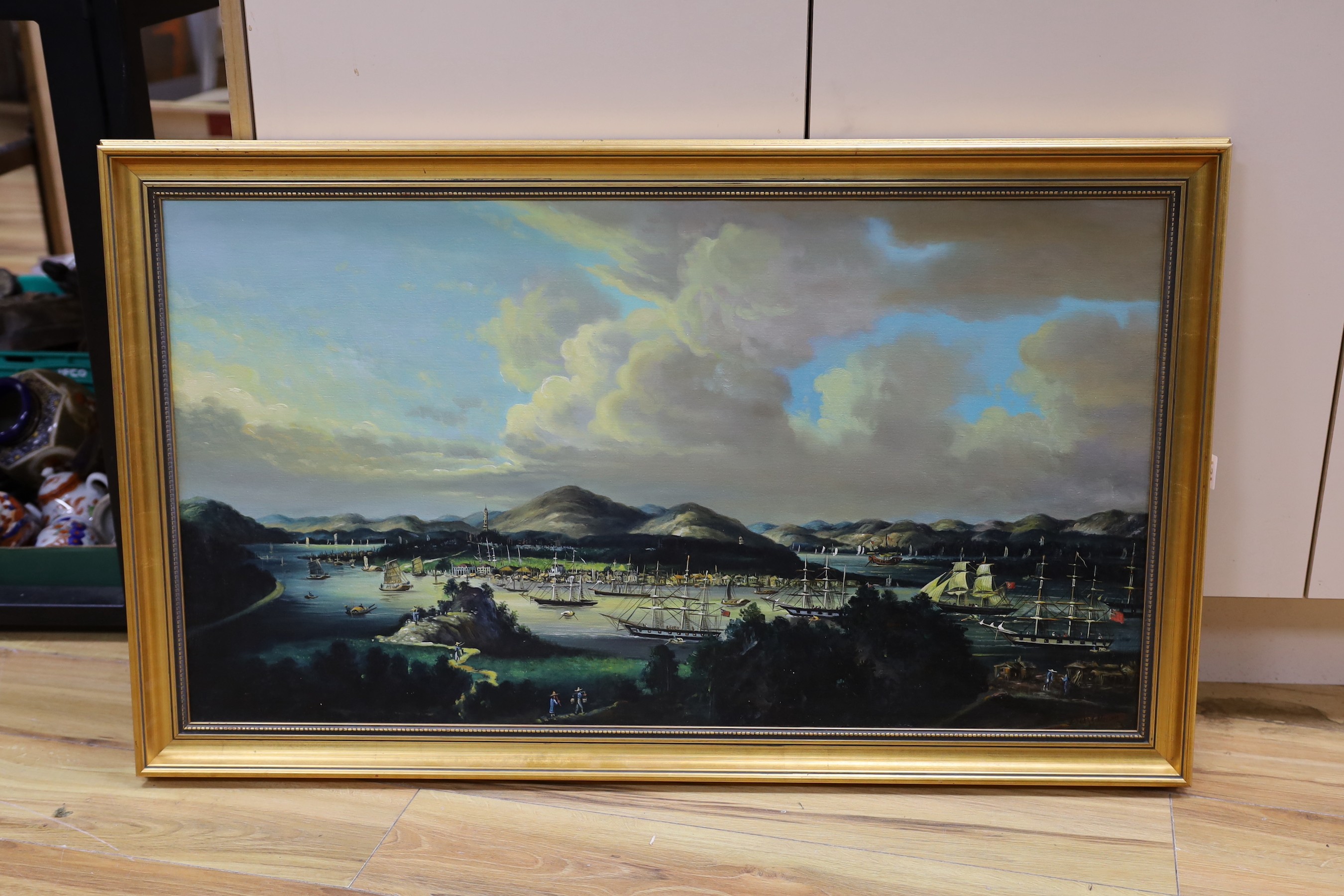 A modern oil on canvas in the Anglo-Chinese manner of frigates and junks along the coast, indistinctly signed, 50 x 90cm